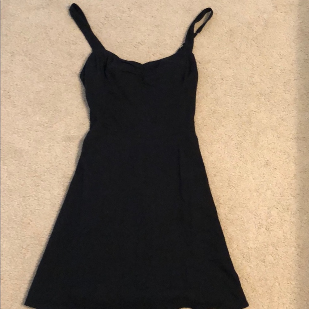 Adorable black short dress.